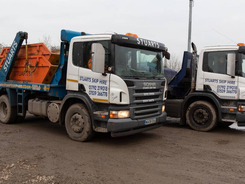Skip delivery trucks